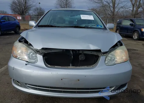 2005 Toyota Corolla Le z USA, uszkodzony, nr VIN 2T1BR32E55C411531